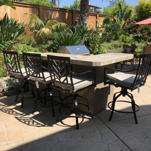 L shape BBQ island with bar seating and four chairs